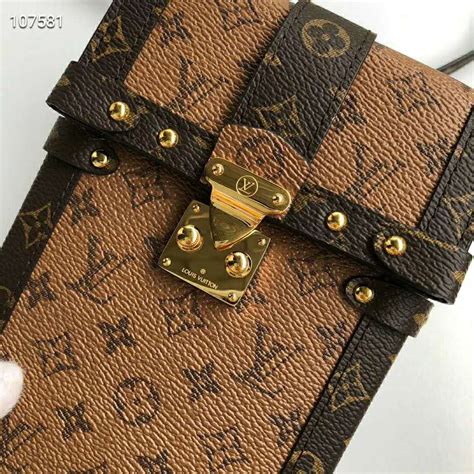 louis vuitton monogram canvas vertical trunk pochette